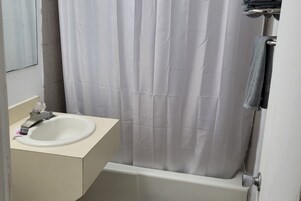 Designer toiletries, hair dryer, towels, soap