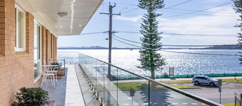 Shoal Towers, 4/11 Shoal Bay Road straight across the road to the beach