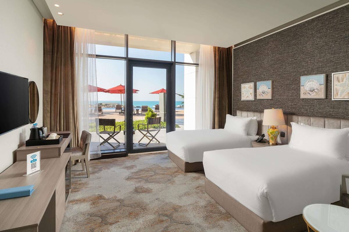 Kamar Deluks, 2 Tempat Tidur Twin | Minibar gratis, brankas, tirai kedap cahaya, dan kedap suara