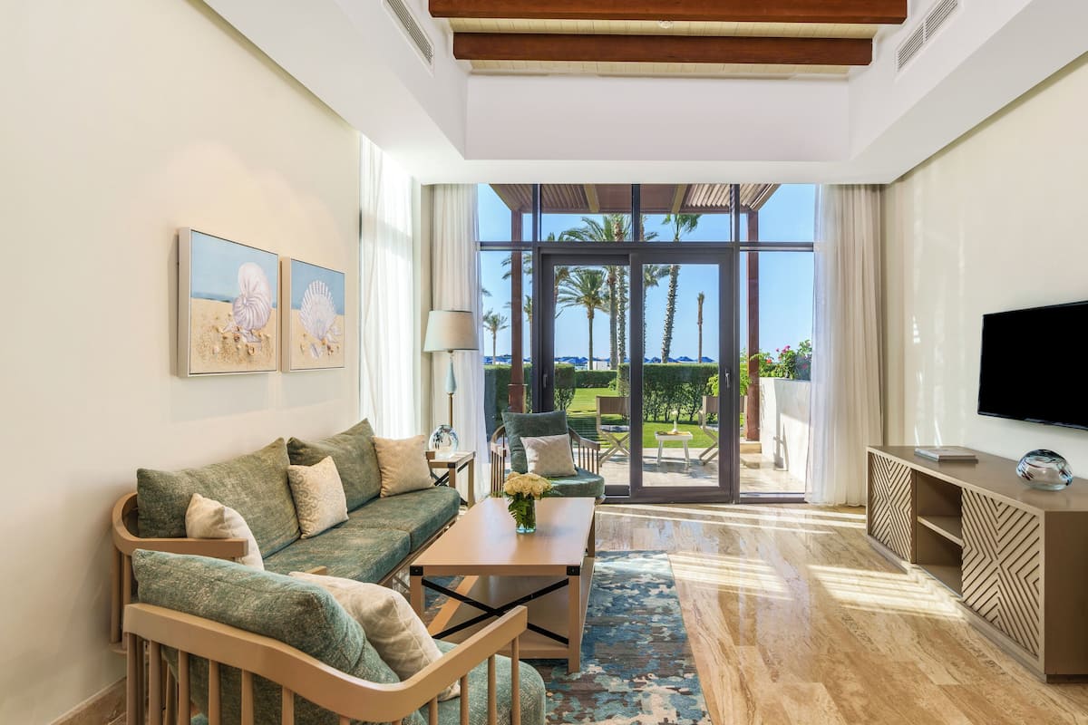 Chalet Beach Front | Living area | 49-inch Smart TV with satellite channels, TV