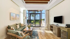 Chalet Beach Front | Living area | 49-inch Smart TV with satellite channels, TV - Rixos Premium Alamein (El Alamein)