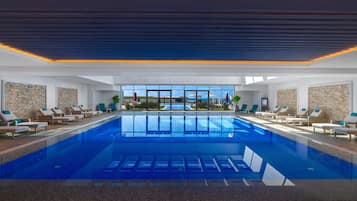 Indoor pool, seasonal outdoor pool, sun loungers, lifeguards on site