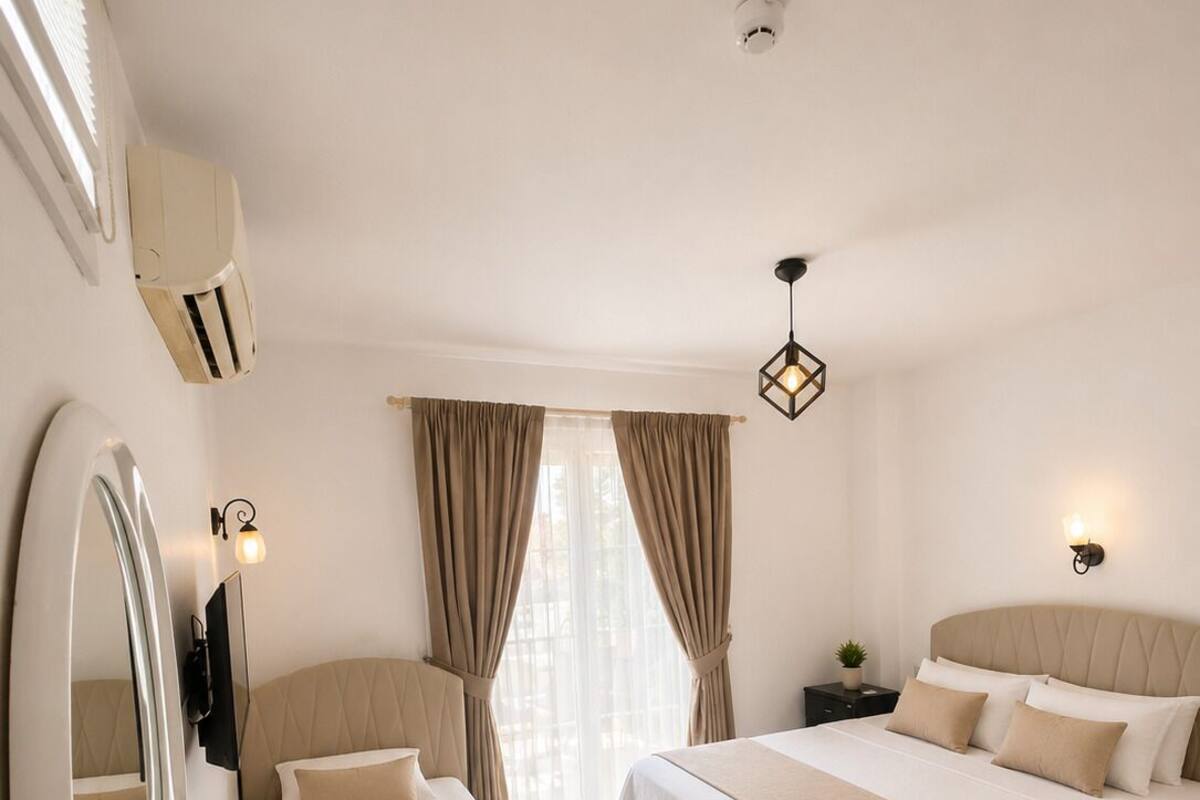 Deluxe Room, Garden Area | Premium bedding, down comforters, memory foam beds, WiFi