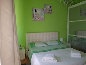 Appartement, plusieurs lits | 3 chambres, Wi-Fi gratuit, draps fournis