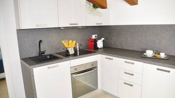 Familienapartment | Eigene Küche | Kühlschrank, Herdplatte, Geschirrspüler, Toastergrill