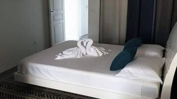 1 chambre, fer et planche Ă  repasser, Wi-Fi gratuit, draps fournis