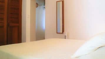 1 bedroom, desk, iron/ironing board, travel crib