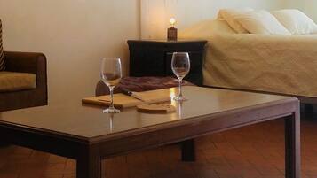 1 bedroom, desk, iron/ironing board, travel crib