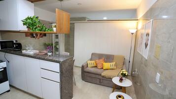 Quarto conforto | Área de estar