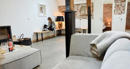 Historic designer loft on a 400-year-old farmhouse | ALTES TORFHAUS