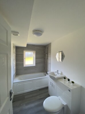 Combined shower/tub