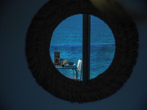 Appartement confortable et moderne climatisé, deux espaces nuit, terrasse vue magnifique sur mer | Area keluarga | Televisi layar datar 32-inci dengan saluran TV digital dan TV