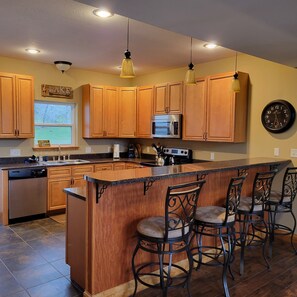 Fridge, microwave, oven, stovetop - 6-bedroom vacation home just 10 minutes from town. (Gravois Mills)