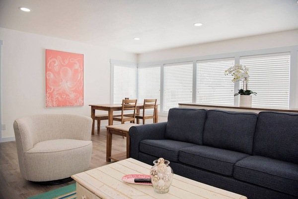 The gathering spot for the family, the dining/living room. Perfect for snuggling up for a movie or a competitive card game.