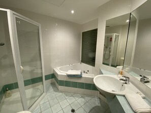 Bathtub, jetted bath, hair dryer, towels
