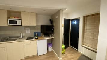 Fridge, microwave, electric kettle, toaster