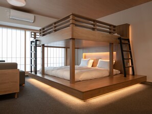 A bunk bed with a wooden frame and a ladder, a bedside table, and a chair. - MIMARU Tokyo Kinshicho (Tokyo)