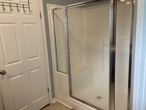 Combined shower/tub, hair dryer, soap, toilet paper