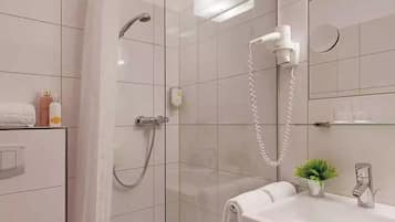 Buồng tắm vòi sen, khăn tắm