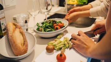 Full-size fridge, microwave, stovetop, coffee/tea maker