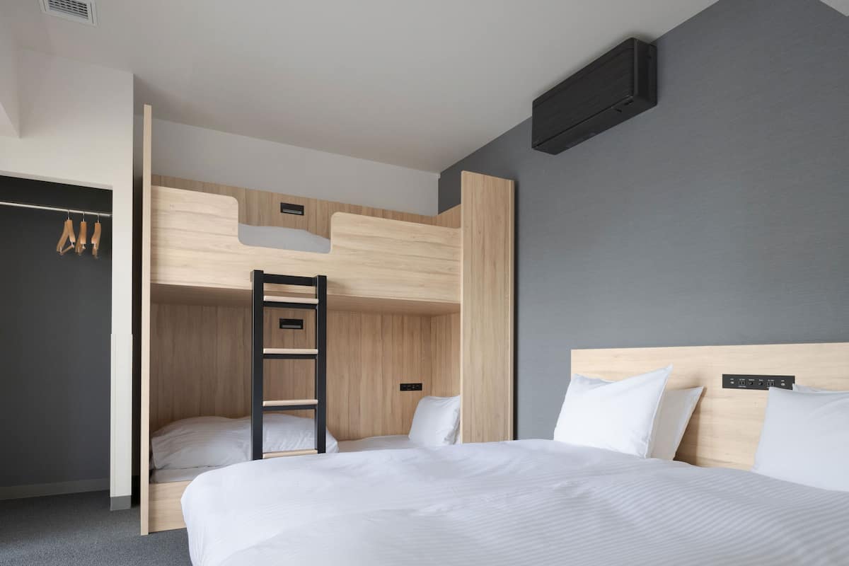Family Apartment Non Smoking | 1 bedroom, down comforters, in-room safe, desk