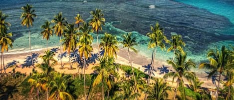 On the beach, sun-loungers, beach towels