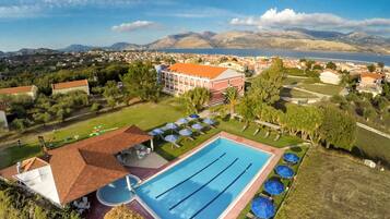 Seasonal outdoor pool, pool umbrellas, sun loungers