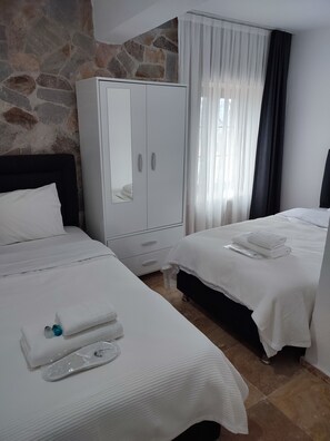 Family Suite | 2 bedrooms, minibar, free WiFi, bed sheets
