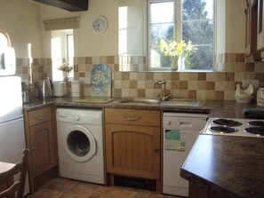 Dishwasher, high chair, cookware/dishes/utensils