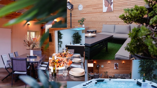 A modern outdoor dining area with a hot tub, wooden walls, and a cozy seating area. - Les Sycomores large 8-person gîte with spa, 5-minute walk from the sea (Ver-sur-Mer)