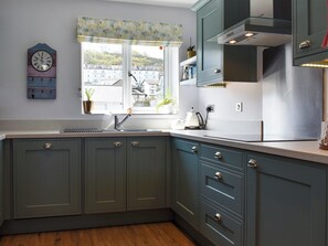 Dishwasher, high chair, cookware/dishes/utensils