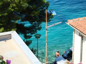 Apartamento, várias camas | Sacada