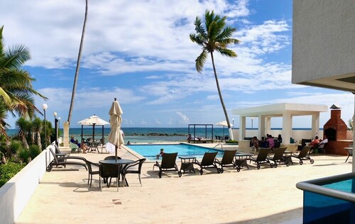 Private Beachfront Property with access to private pool, hot tub and beach!