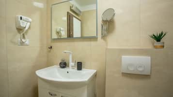 Shower, towels, soap, shampoo