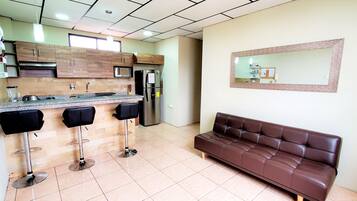 Comfort Apartment | Living room | 42-inch Smart TV with cable channels, TV