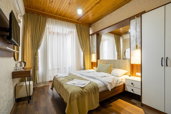 Habitación Confort | Ropa de cama de alta calidad y minibar