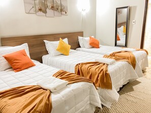 Triple Room | Down duvets, minibar, desk, laptop workspace - El Nogal Casa Hotel (Asunción)