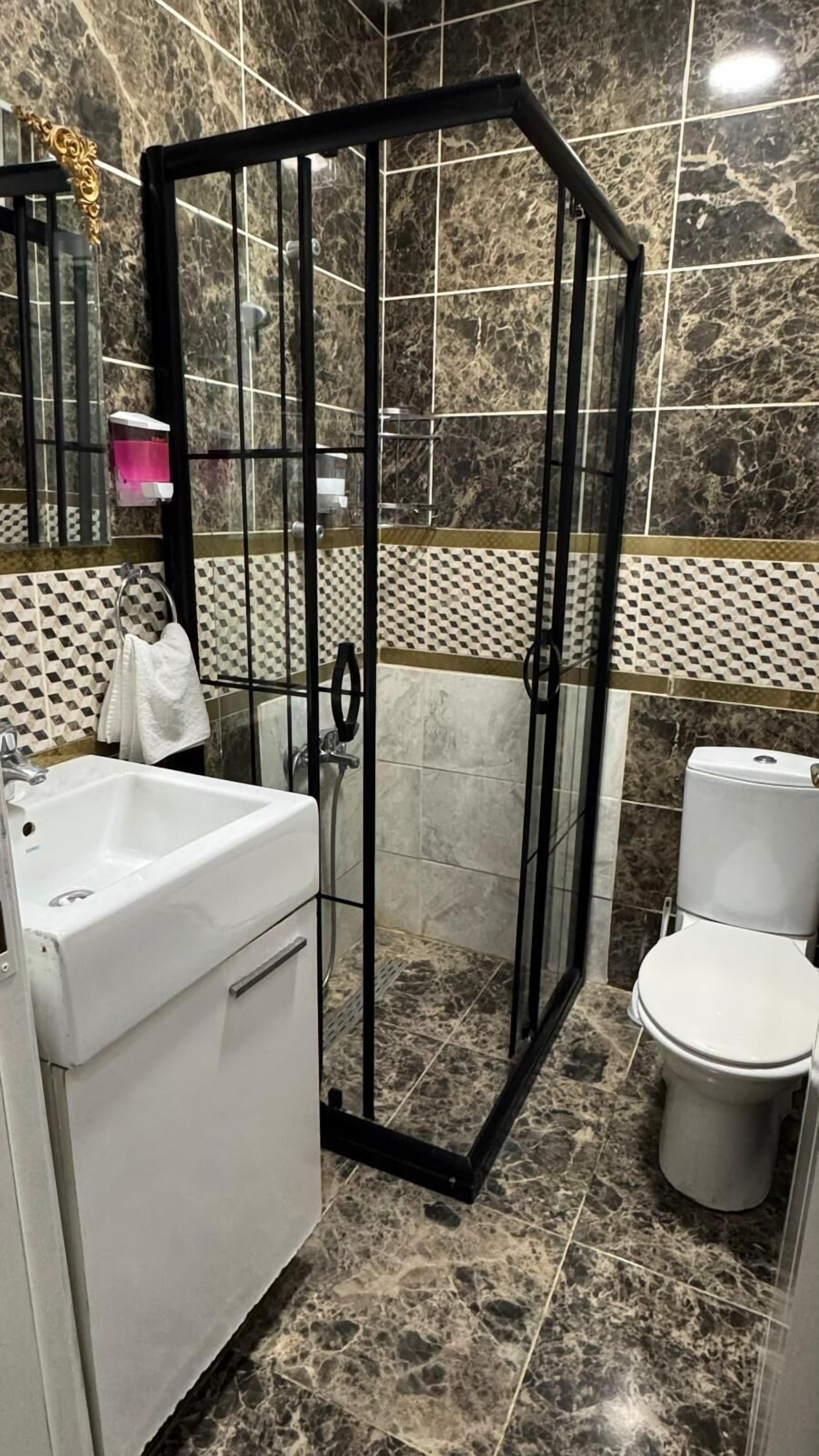 Family Condo, City View | Bathroom | Hair dryer, soap, shampoo, toilet paper