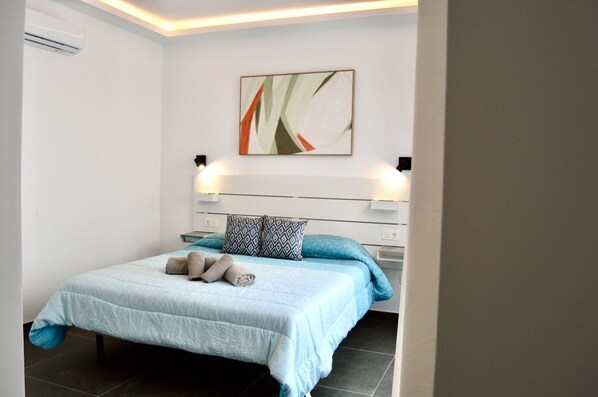 4 chambres, coffre-fort, fer et planche à repasser, lit de bébé portatif