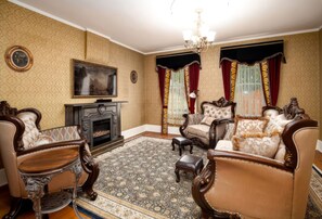 TV, fireplace, books