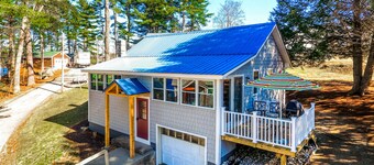 Fully renovated home with lake view, dock & mooring access, kayaks, & deck