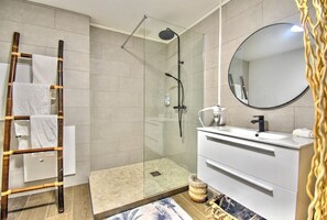 Shower, hair dryer, towels, soap