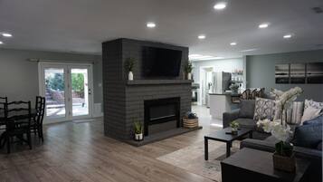 Smart TV, fireplace, books