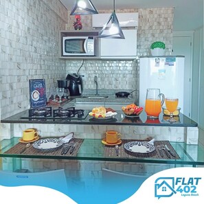 Fridge, microwave, stovetop, coffee/tea maker