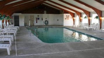 Indoor pool, open 9:00 AM to 9:00 PM, pool loungers