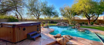 Resort like backyard w/ Heated pool. Home Theater