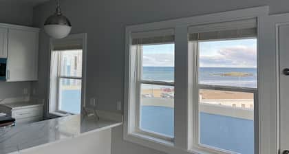 Direct Ocean Front Condo with large wrap around balcony