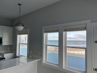 Direct Ocean Front Condo with large wrap around balcony