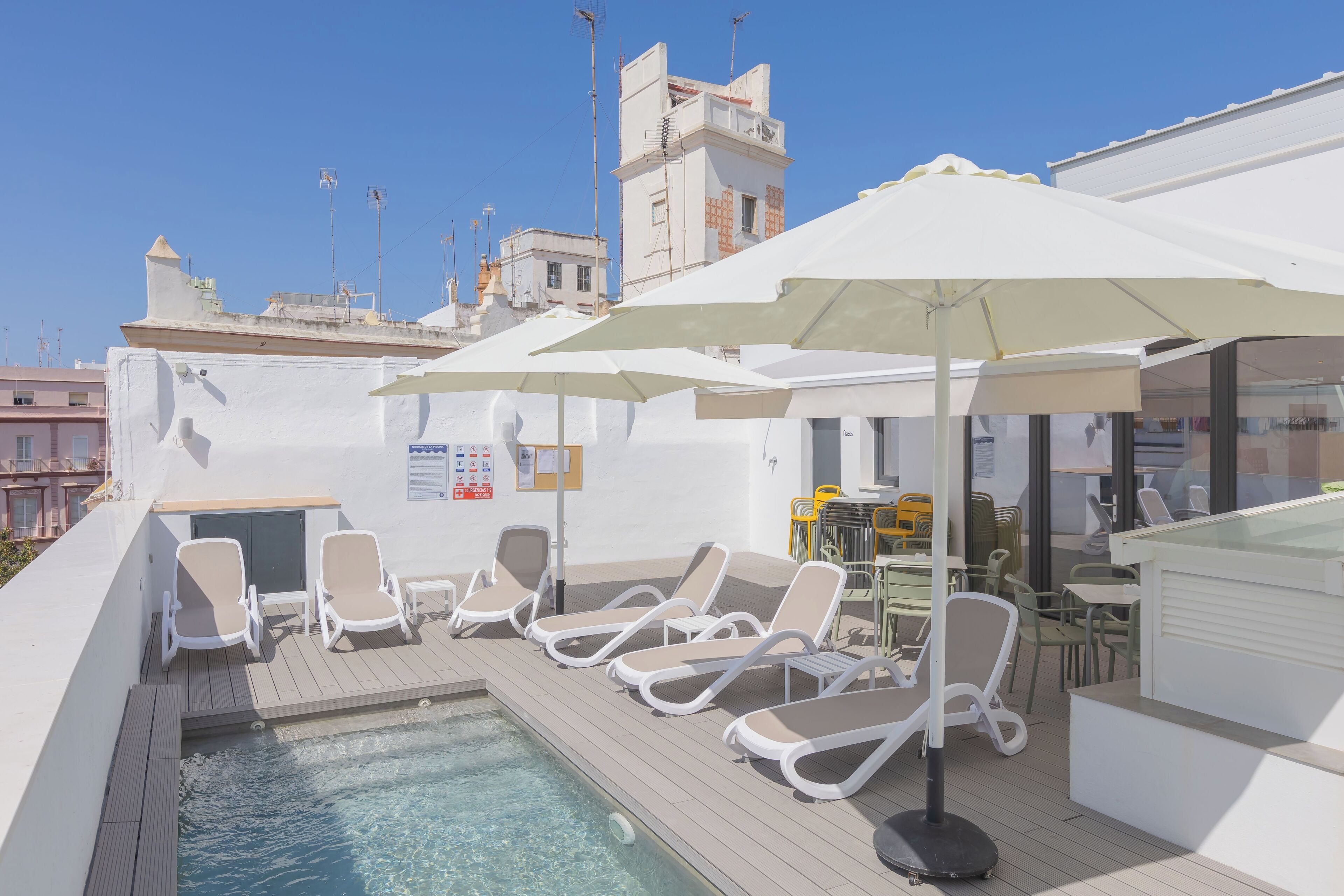 Seasonal outdoor pool, pool umbrellas, sun loungers