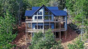 A two-story wooden cabin with a balcony, surrounded by trees. - Breathtaking LongRange Mntn Views 10min downtown BR & McCaysville Riverwalk (Blue ridge)